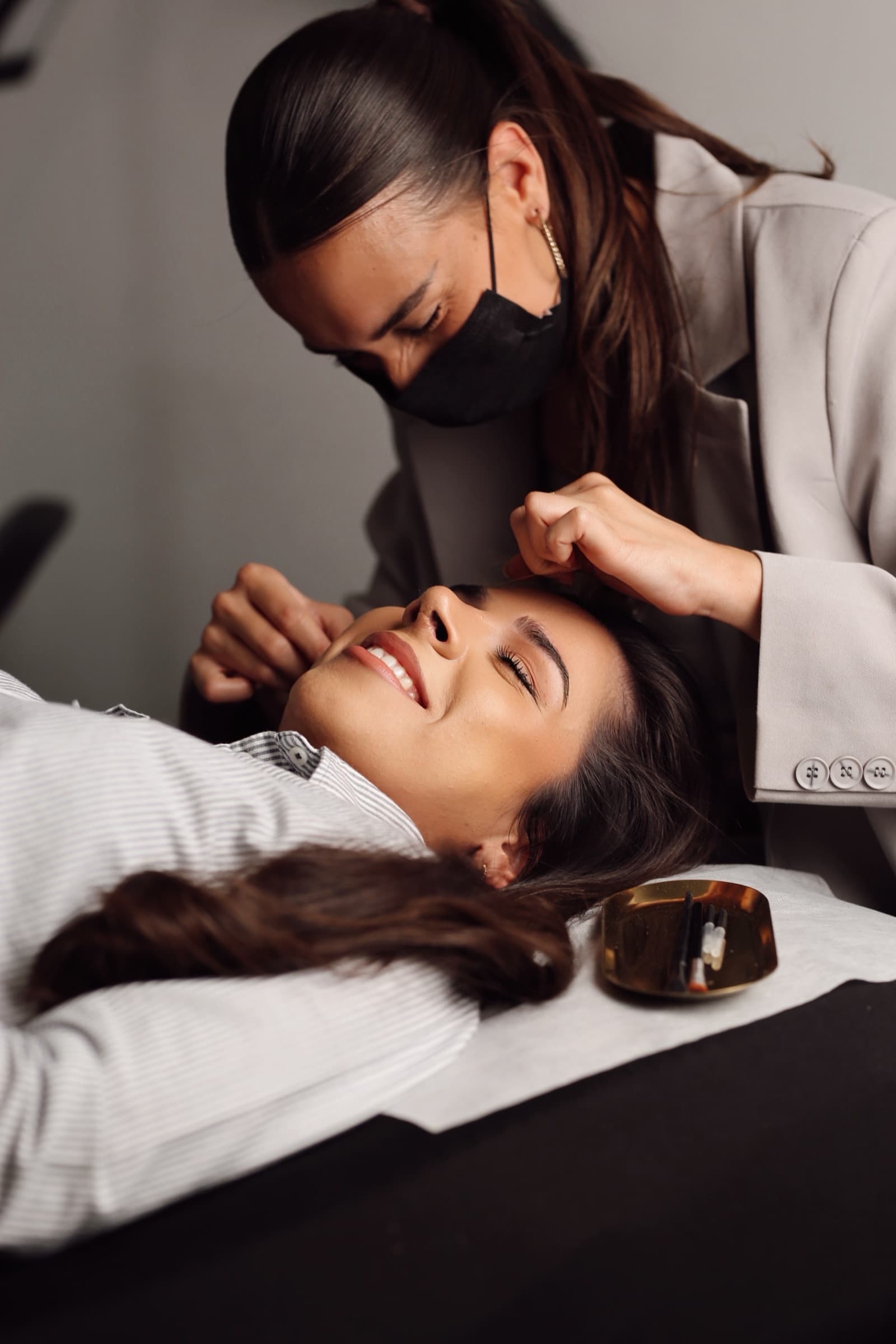 A lash treatment in progress on the salon bed