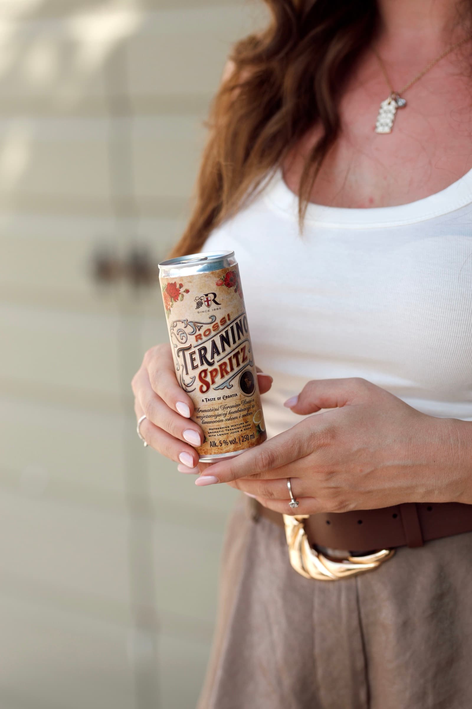Teranino Spritz can held at the waist over a white tank