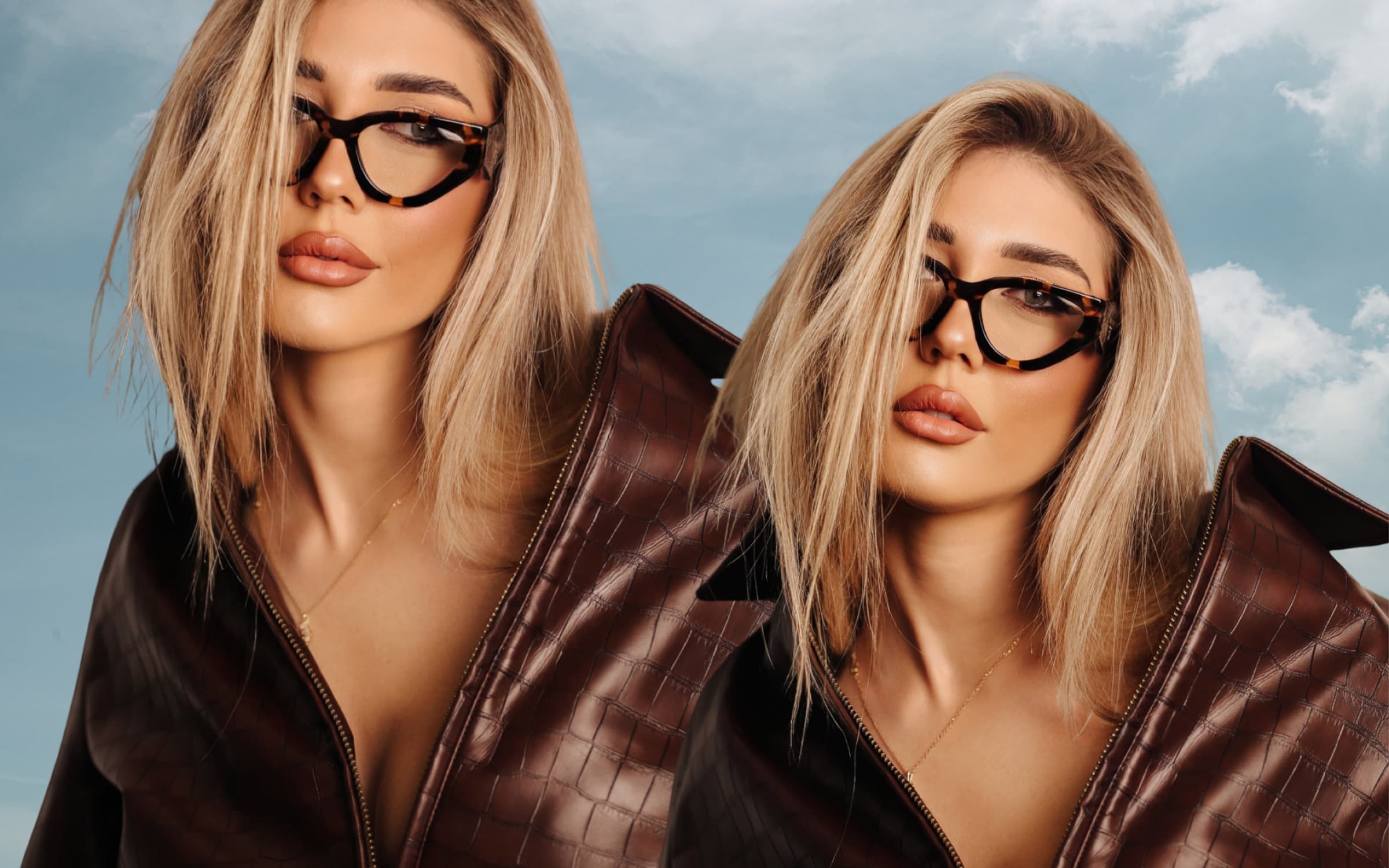 Two models in brown leather and optical frames against the sky